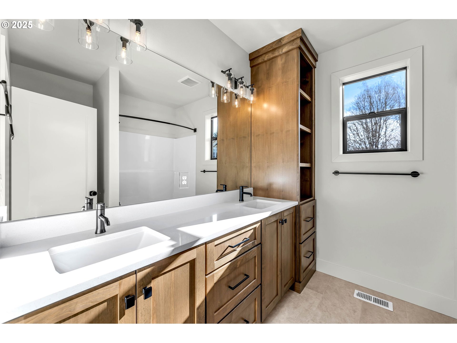 718 South 15th Court Ridgefield, WA 98642 - Photo 39 of 47 a bathroom with a sink and a mirror
