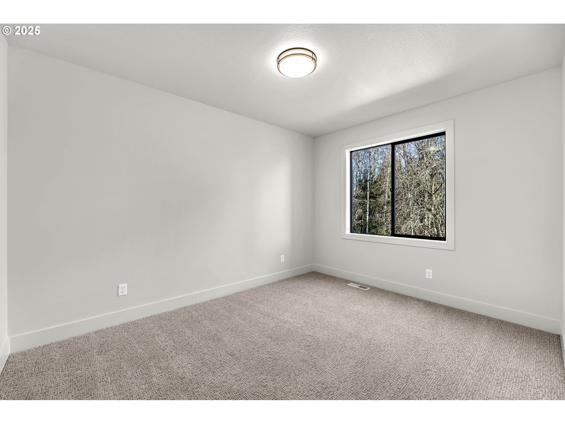 718 South 15th Court Ridgefield, WA 98642 - Photo 42 of 47 a view of an empty room with a window