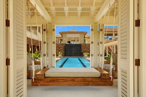 a bathroom with a tub and a shower
