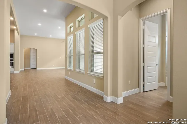 a view of entryway with wooden floor