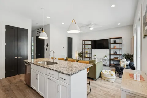 a bathroom with sink and mirror