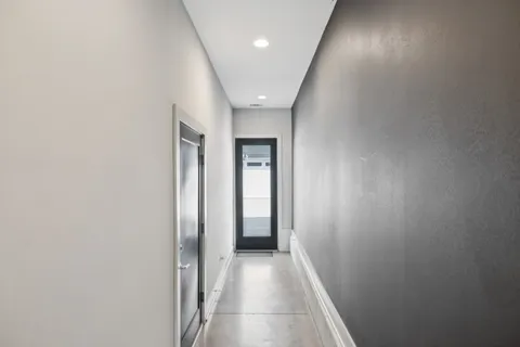 a view of hallway with livingroom