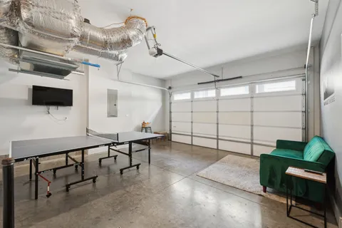 a view of a workspace with furniture