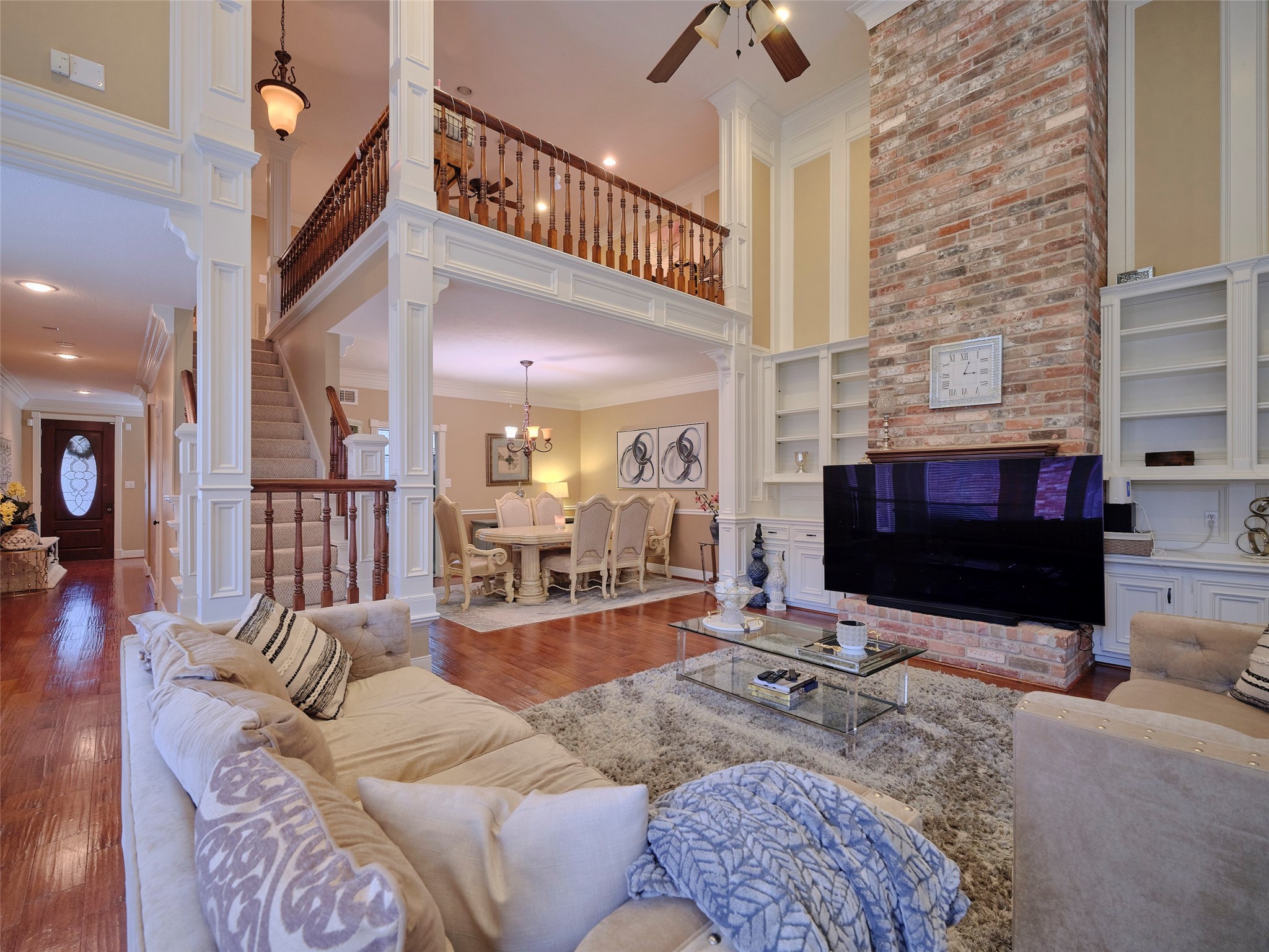 16623 Manningtree Lane Spring, TX 77379 - Photo 14 of 39 a living room with furniture flat screen tv and a fireplace
