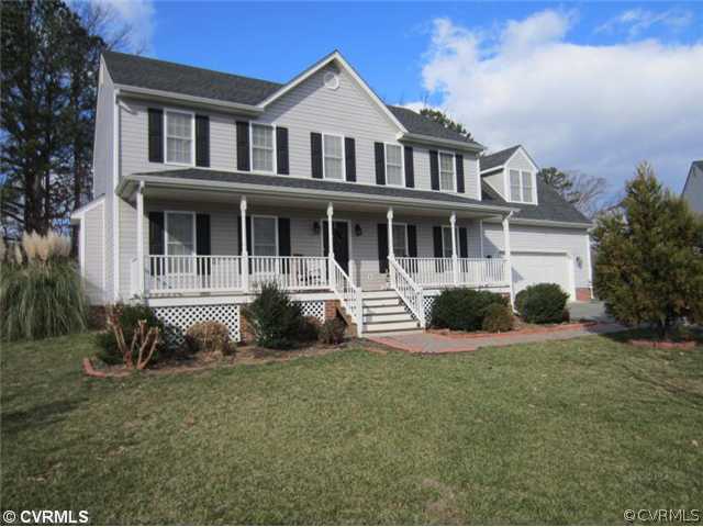 3508 Pease Road Midlothian, VA 23112 - Photo 1 of 12 a front view of a house with a yard
