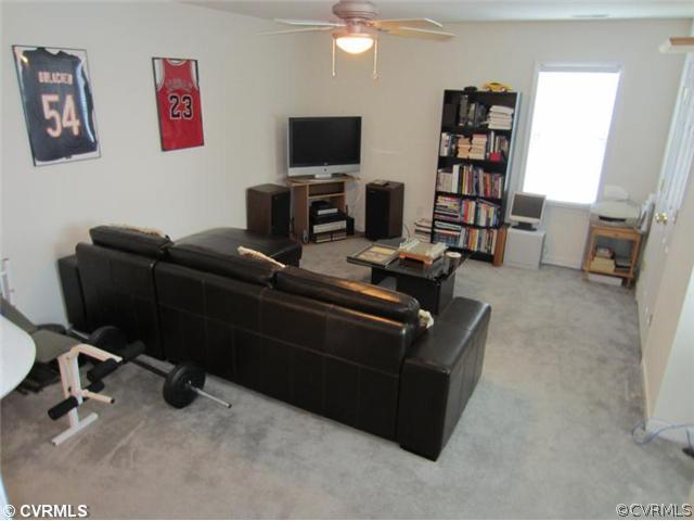 3508 Pease Road Midlothian, VA 23112 - Photo 12 of 12 a living room with furniture and a flat screen tv