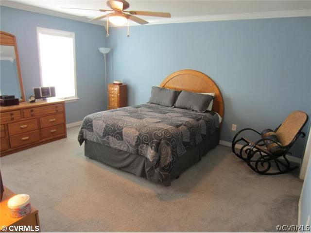 3508 Pease Road Midlothian, VA 23112 - Photo 8 of 12 a bedroom with bed and window