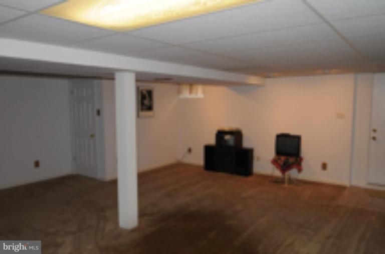 9118 Kilbride Road Nottingham, MD 21236 - Photo 12 of 22 a view of an empty room
