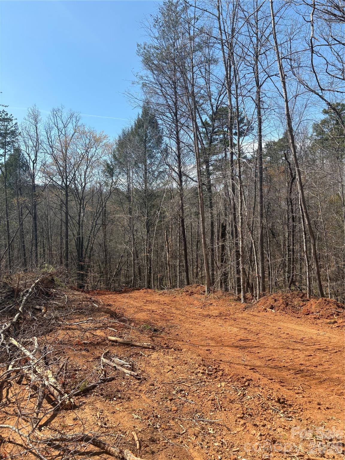 Tbd Avenida De Oro Road, Unit 2 3 Morganton, NC 28655 - Photo 1 of 2 a wooden fence with trees in the background