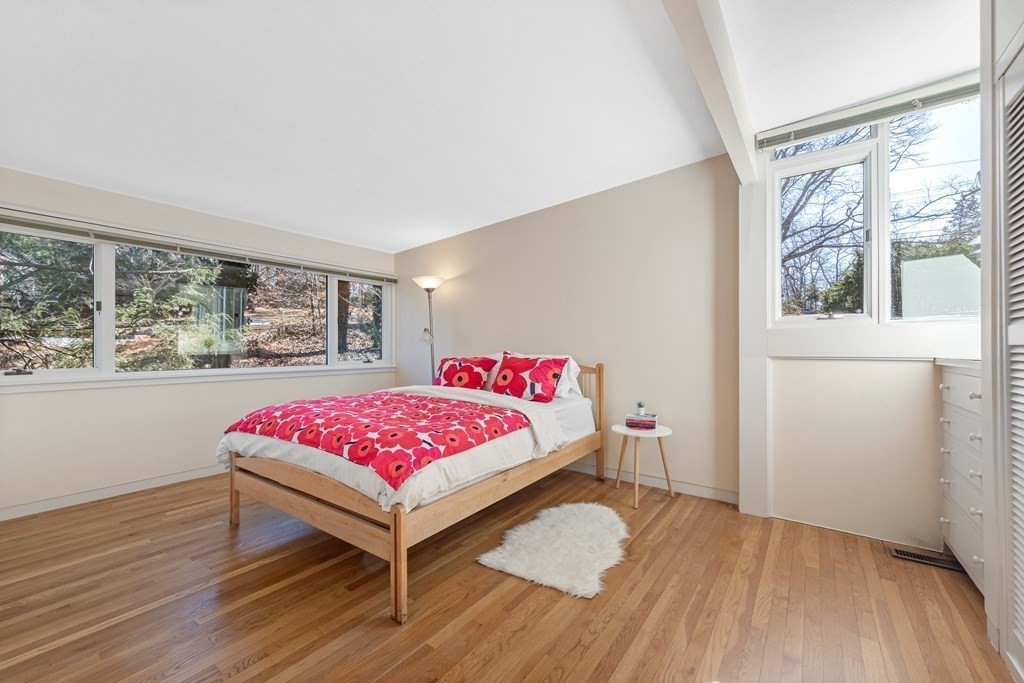 5 Field Road Lexington, MA 02421 - Photo 13 of 31 a bedroom with a bed and a large window