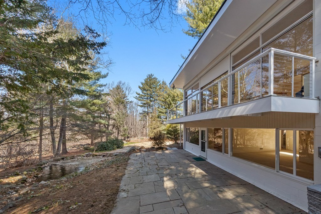 5 Field Road Lexington, MA 02421 - Photo 20 of 31 a view of a building with a street