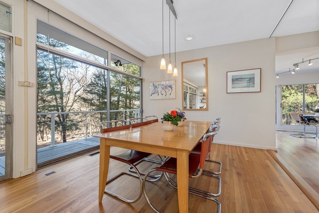 5 Field Road Lexington, MA 02421 - Photo 8 of 31 a view of a dining room with furniture window and wooden floor