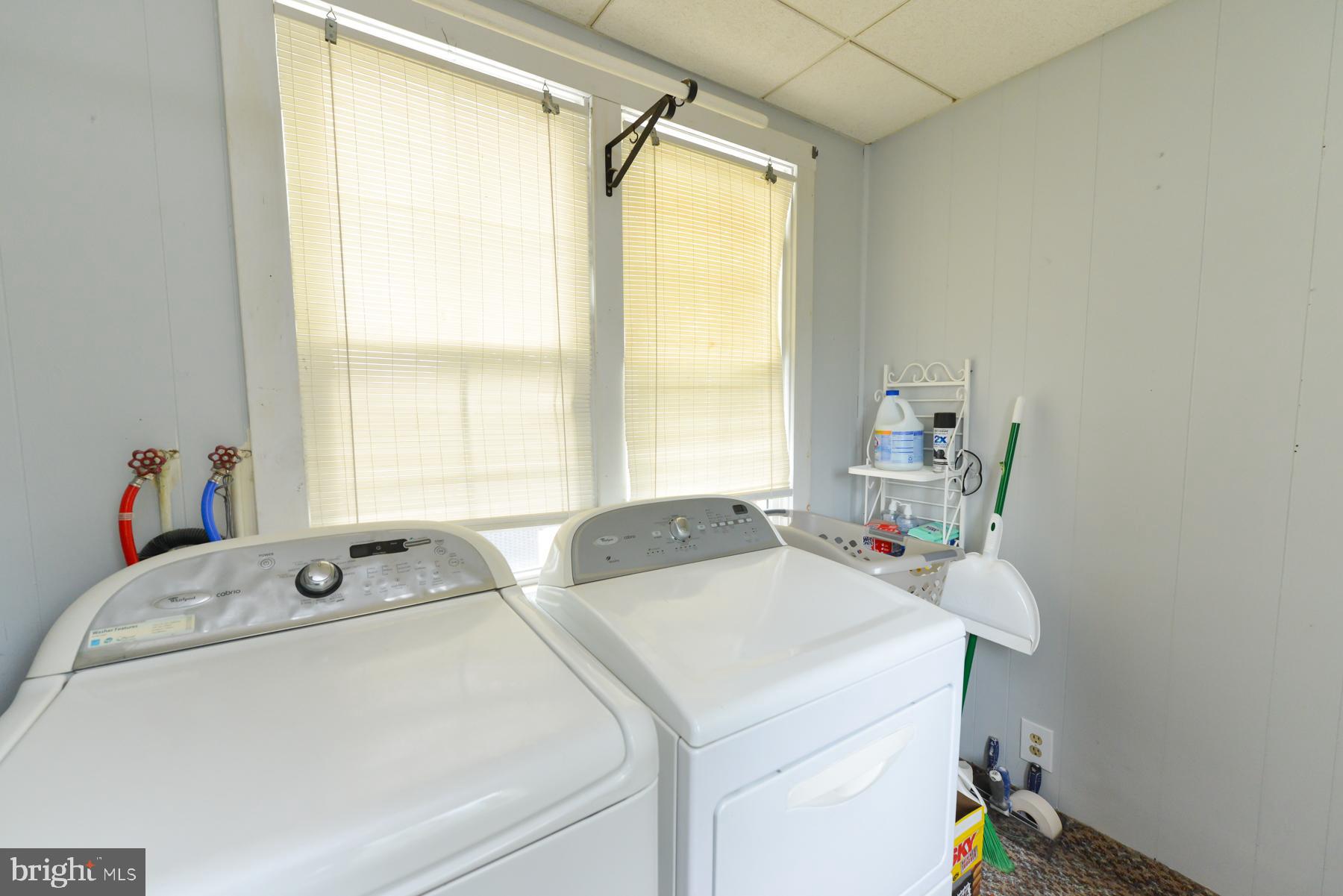 63 New Road Malaga, NJ 08328 - Photo 22 of 26 a utility room with dryer and washer