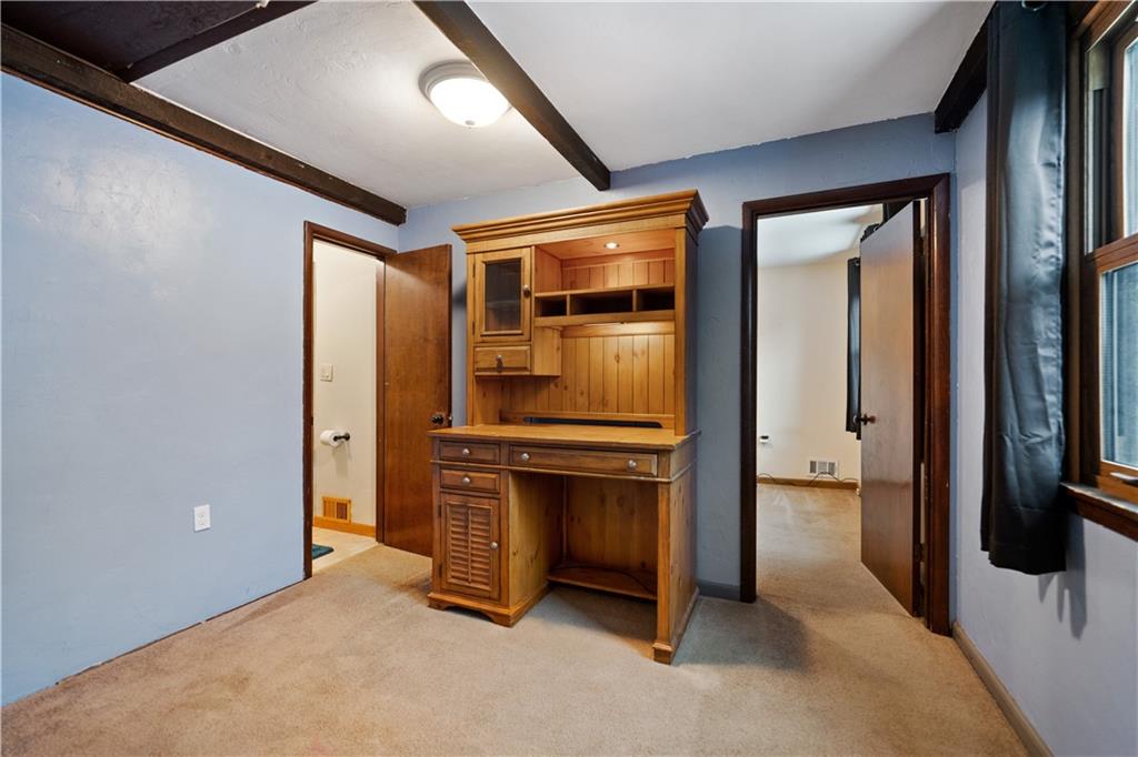 2298 Evergreen Road Pittsburgh, PA 15237 - Photo 11 of 29 This can be an office space or playroom off of the Primary Bedroom on the main level. The room to the left is the main floor Full Bathroom.