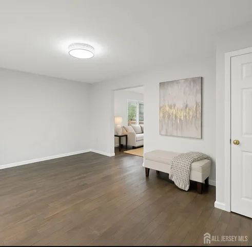 a spacious bedroom with a bed and furniture