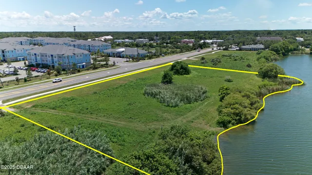 a view of a lake with a city