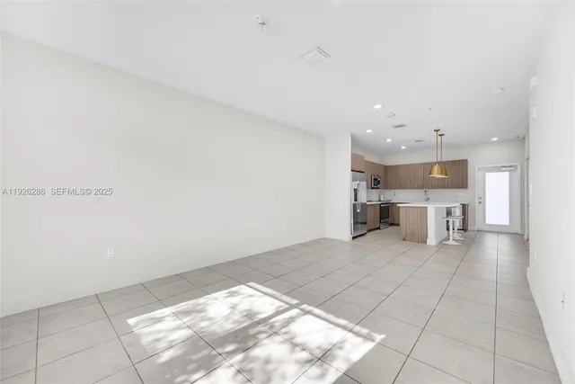 a room with a bed and a window