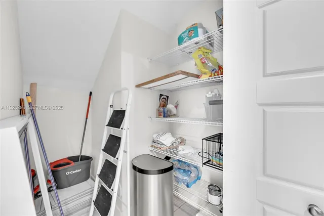 a view of room with window and hardwood