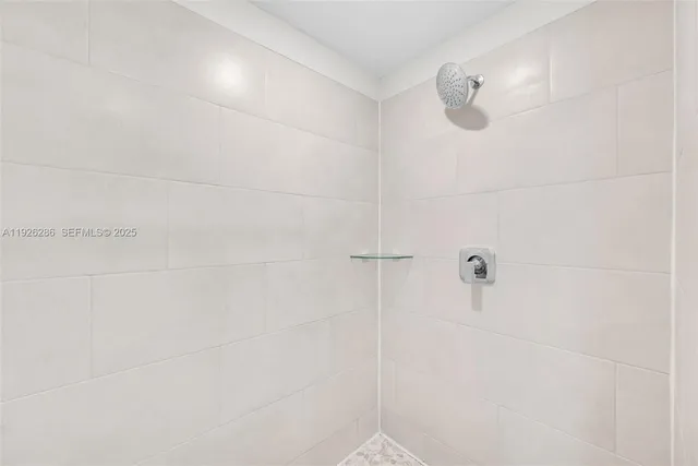 a view of a room with racks on the wall