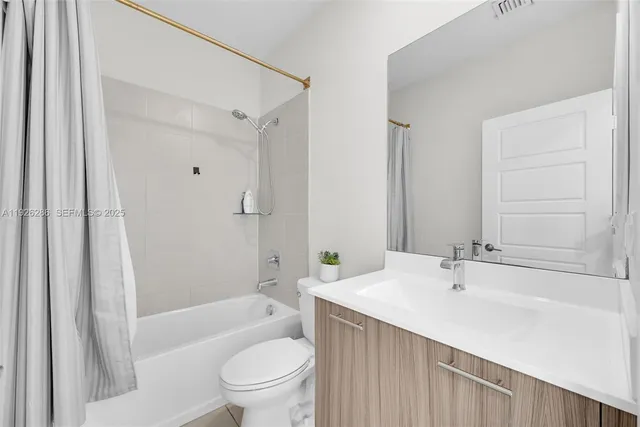 a view of a balcony with wooden fence