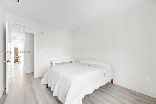 a view of a city from a patio and lake view