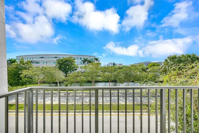 a swimming pool with outdoor seating and yard