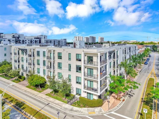 a room with furniture and pool table