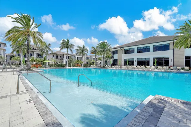 a view of a livingroom with furniture and a table