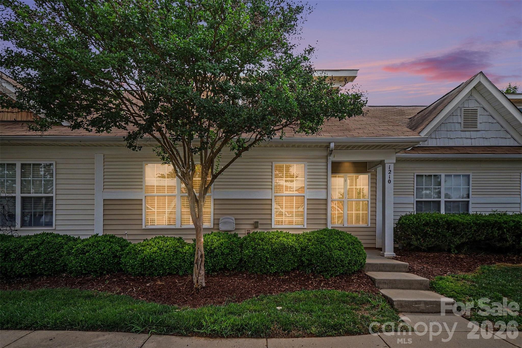 1210 Sheldon Brook Lane Fort Mill, SC 29707 - Photo 2 of 26 a front view of a house with a yard