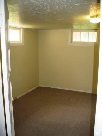 642 East 700 North Logan, UT 84321 - Photo 24 of 33 Below grade area with plenty of natural light and dark colored carpet
