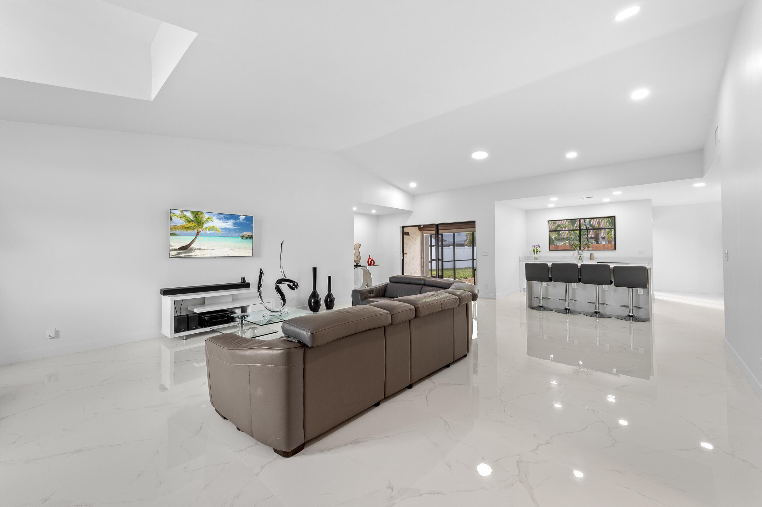 22301 Ensenada Way Boca Raton, FL 33433 - Photo 12 of 44 a living room with furniture and a flat screen tv