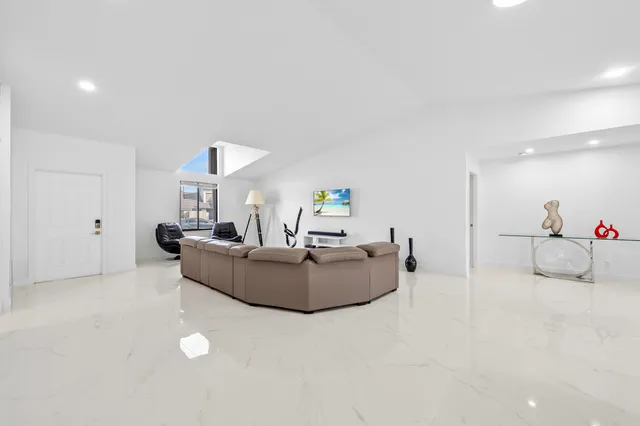 a living room with furniture and a couch