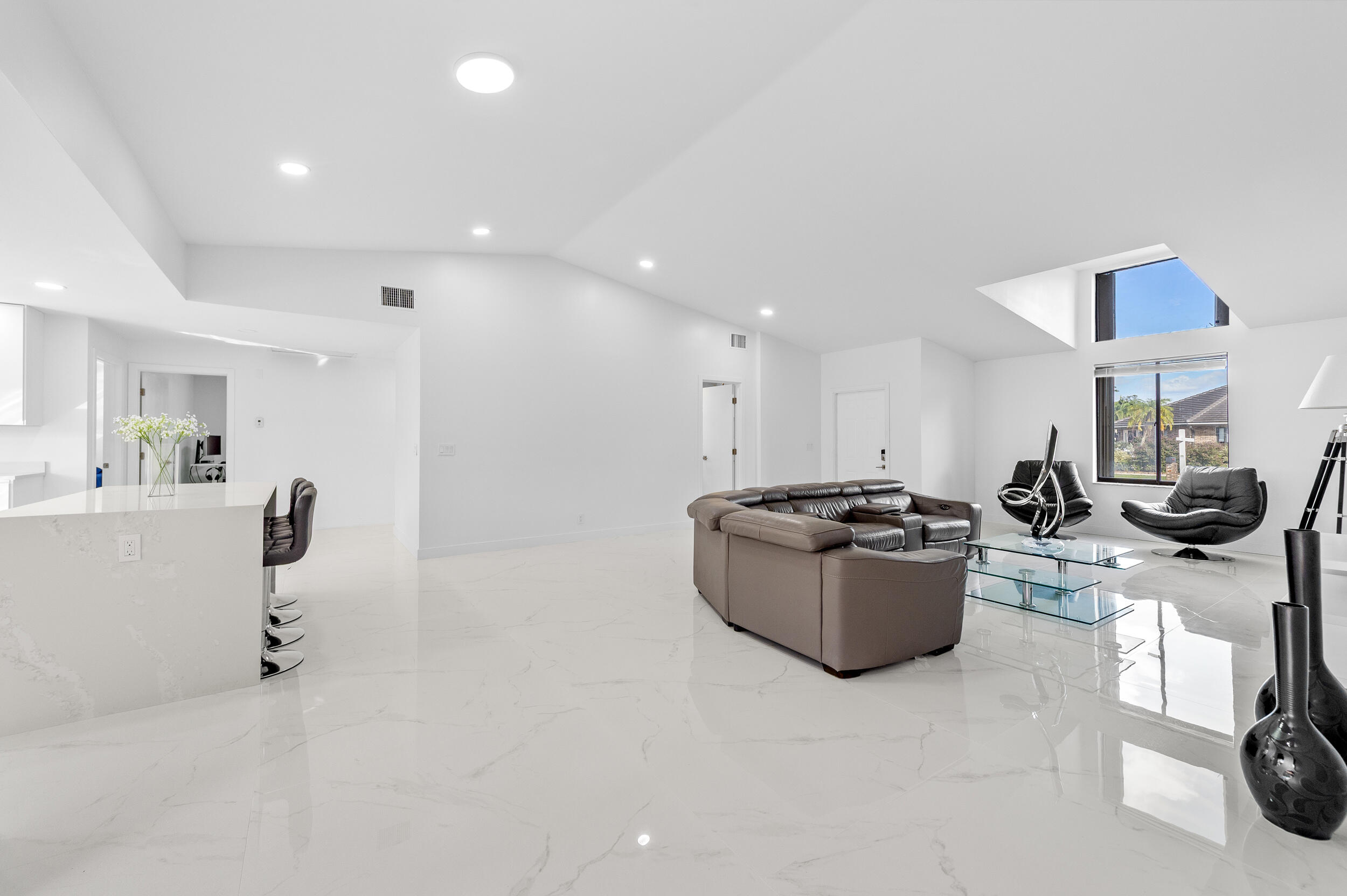 22301 Ensenada Way Boca Raton, FL 33433 - Photo 14 of 44 a living room with furniture and a window