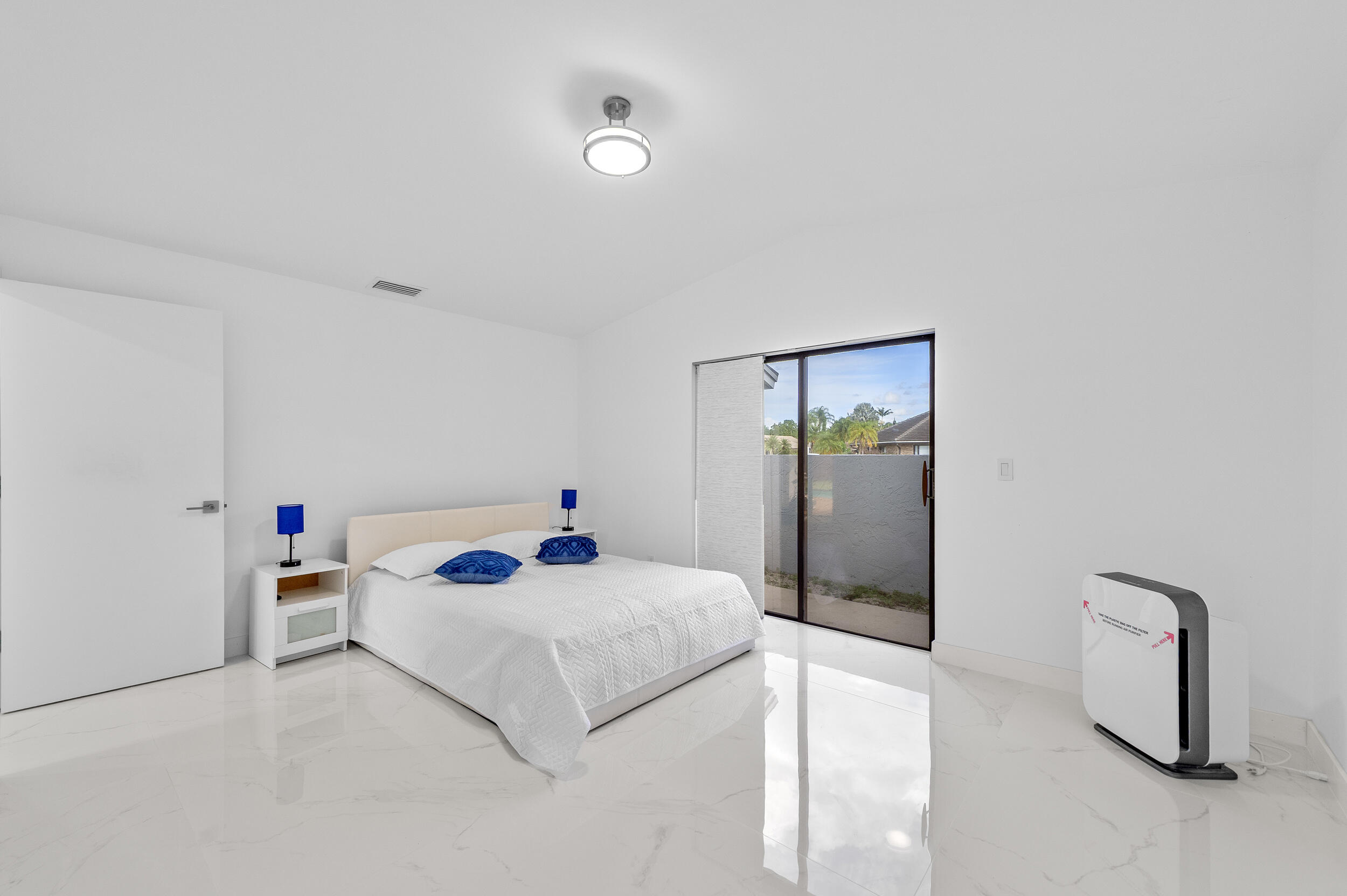 22301 Ensenada Way Boca Raton, FL 33433 - Photo 29 of 44 a living room with furniture and window