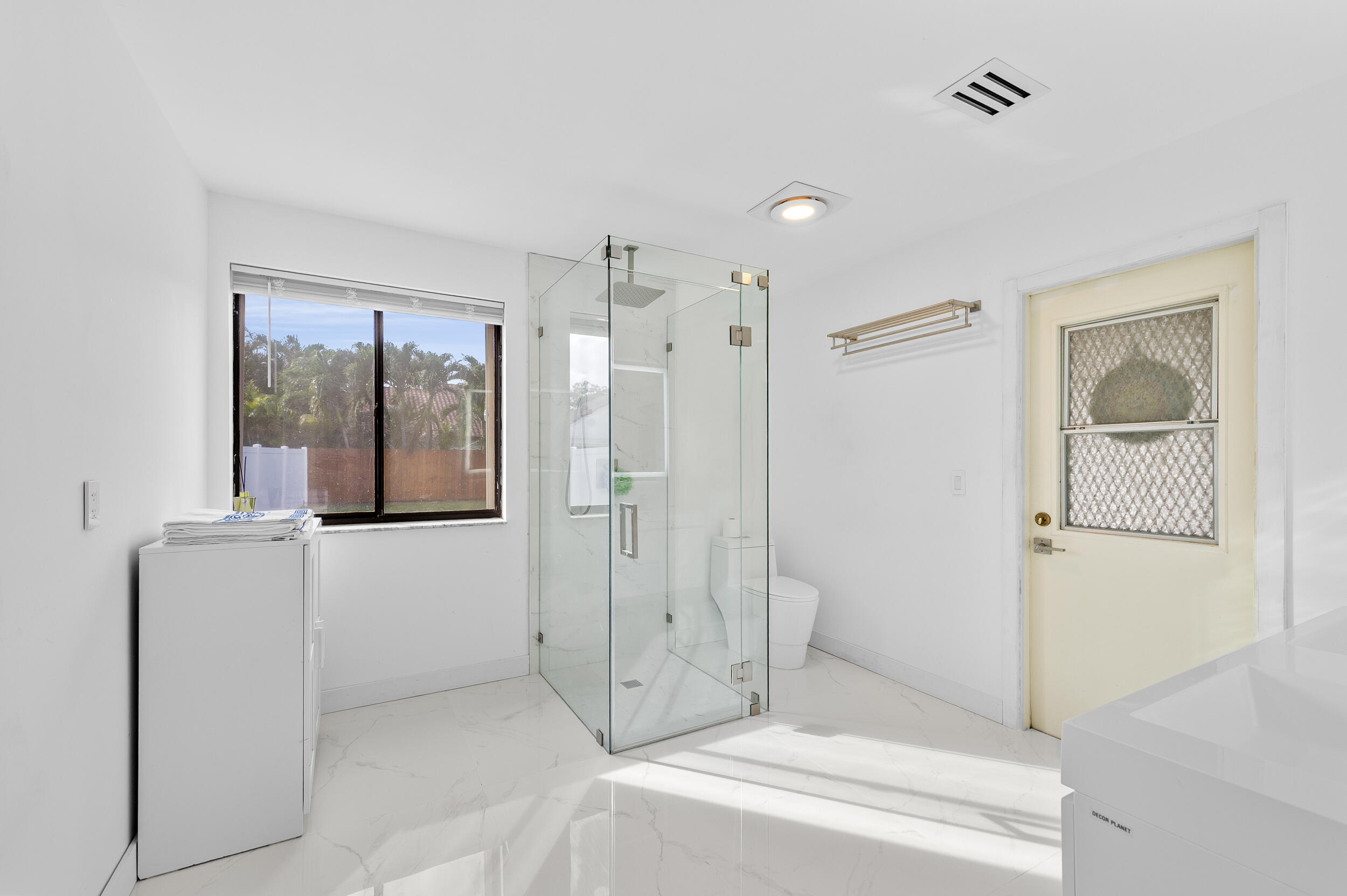 22301 Ensenada Way Boca Raton, FL 33433 - Photo 30 of 44 a bathroom with a shower and a sink