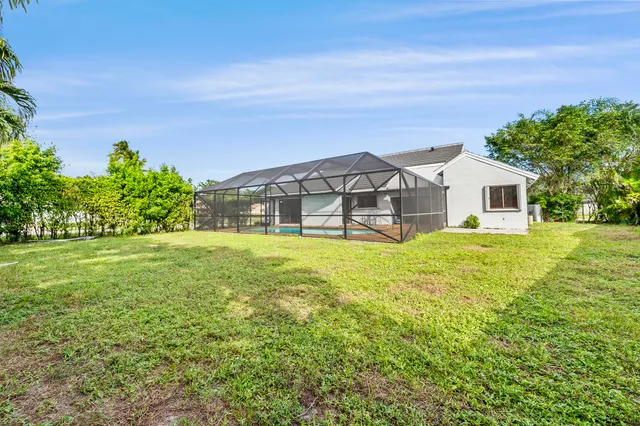 a view of a house with a big yard
