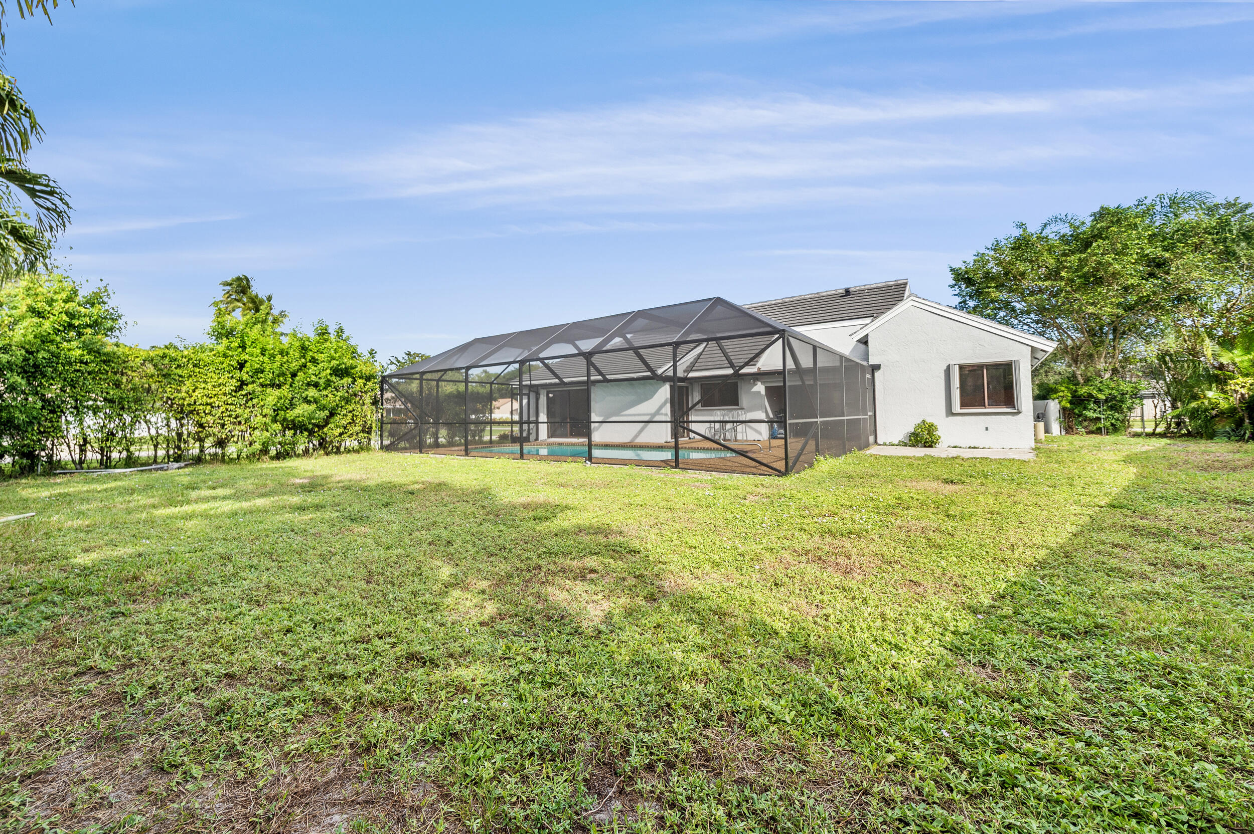 22301 Ensenada Way Boca Raton, FL 33433 - Photo 33 of 44 a view of a house with a big yard