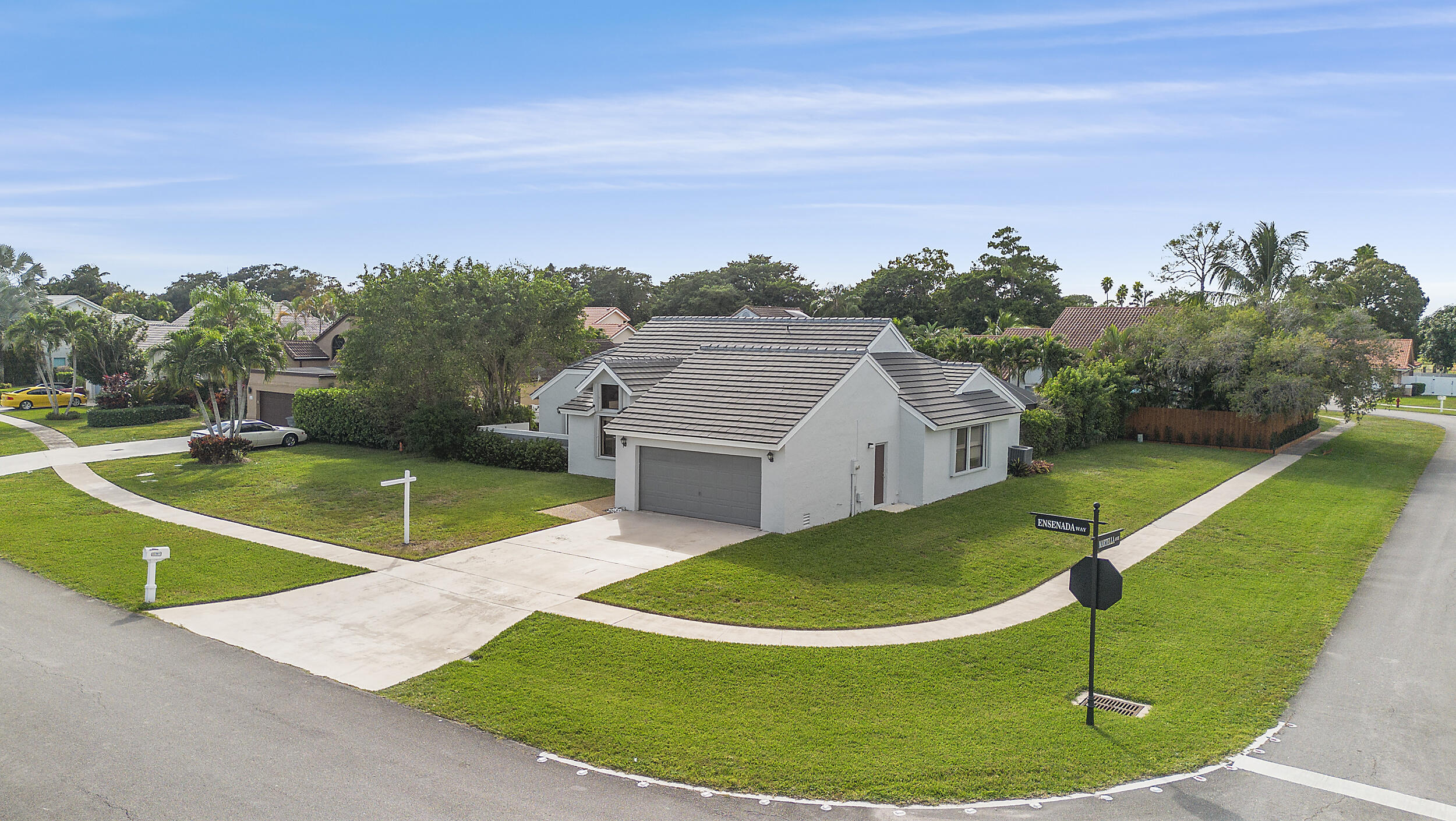 22301 Ensenada Way Boca Raton, FL 33433 - Photo 36 of 44 a view of a swimming pool with a yard