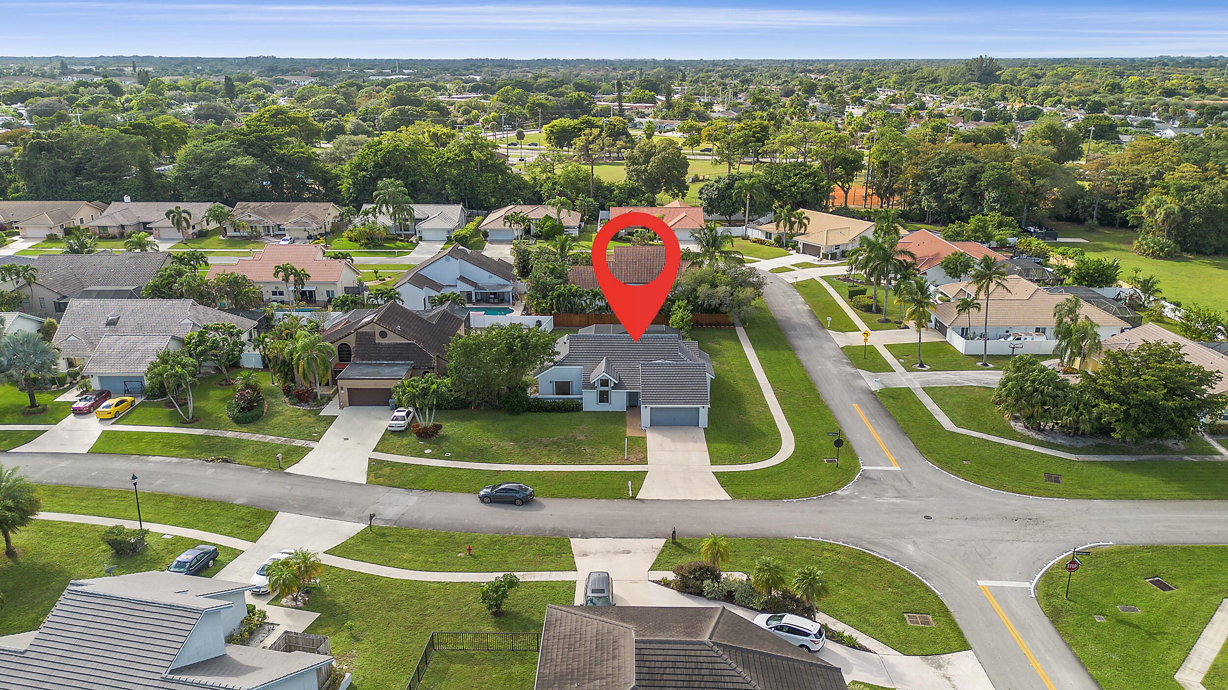 22301 Ensenada Way Boca Raton, FL 33433 - Photo 39 of 44 an aerial view of a swimming pool patio and mountain view