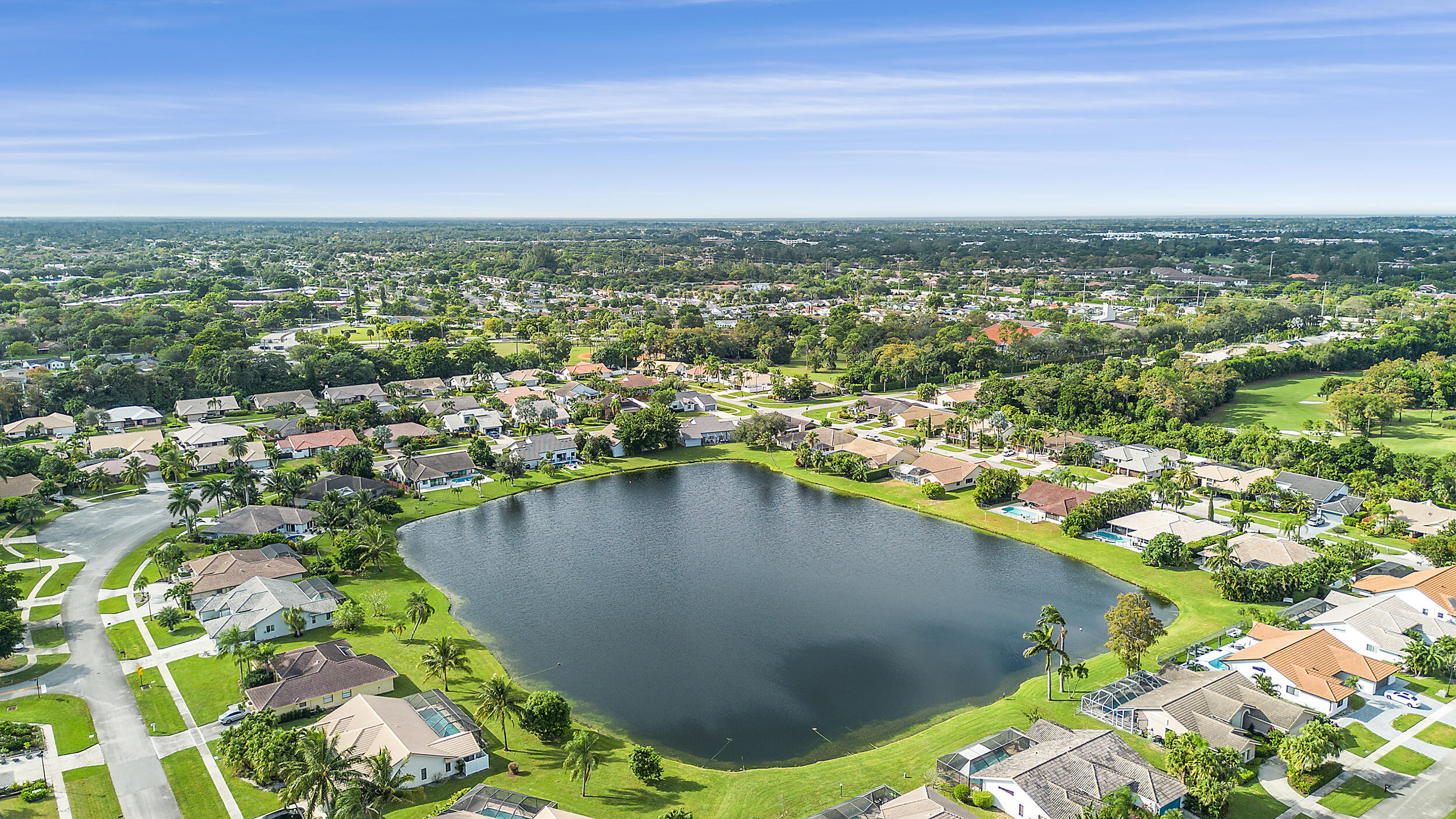 22301 Ensenada Way Boca Raton, FL 33433 - Photo 42 of 44 an aerial view of residential houses with outdoor space
