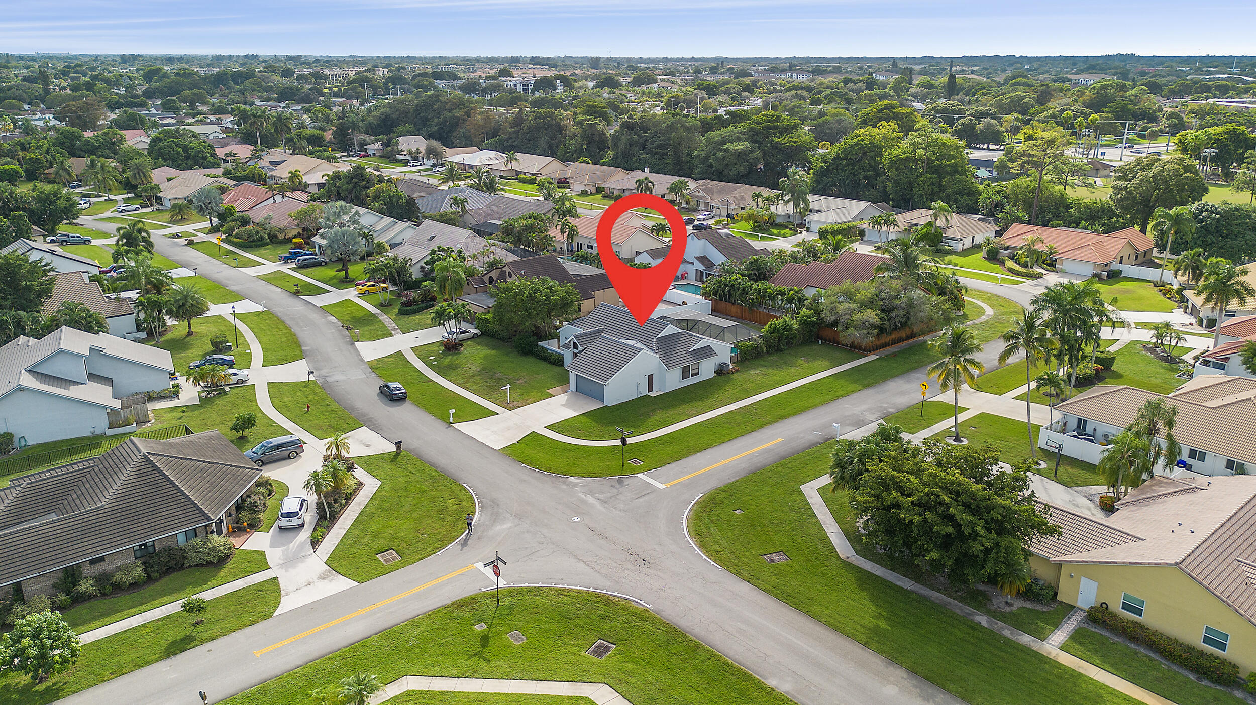 22301 Ensenada Way Boca Raton, FL 33433 - Photo 5 of 44 an aerial view of a pool yard tennis courts and ocean view
