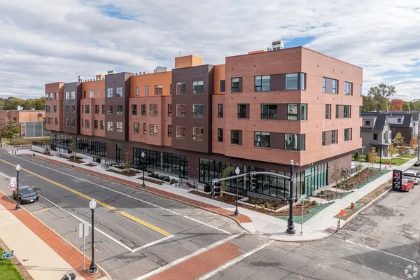 a front view of a multi story building