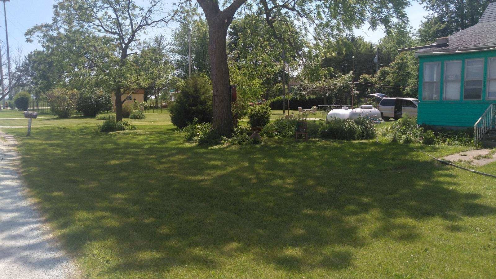1755 North 3200 East Road Sheldon, IL 60966 - Photo 3 of 3 a backyard of a house with lots of green space