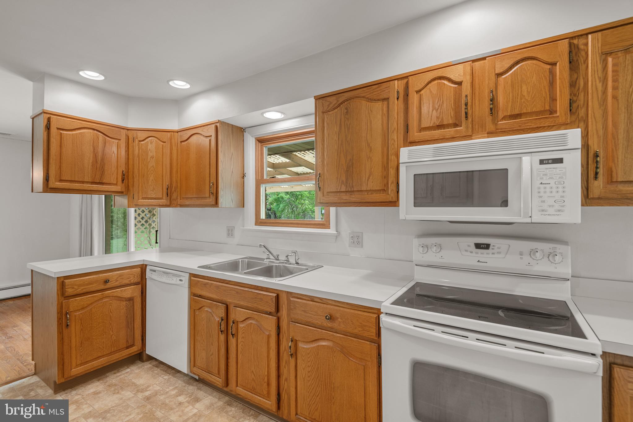27 Pfautz Avenue Lititz, PA 17543 - Photo 11 of 25 a kitchen with a sink cabinets and a window