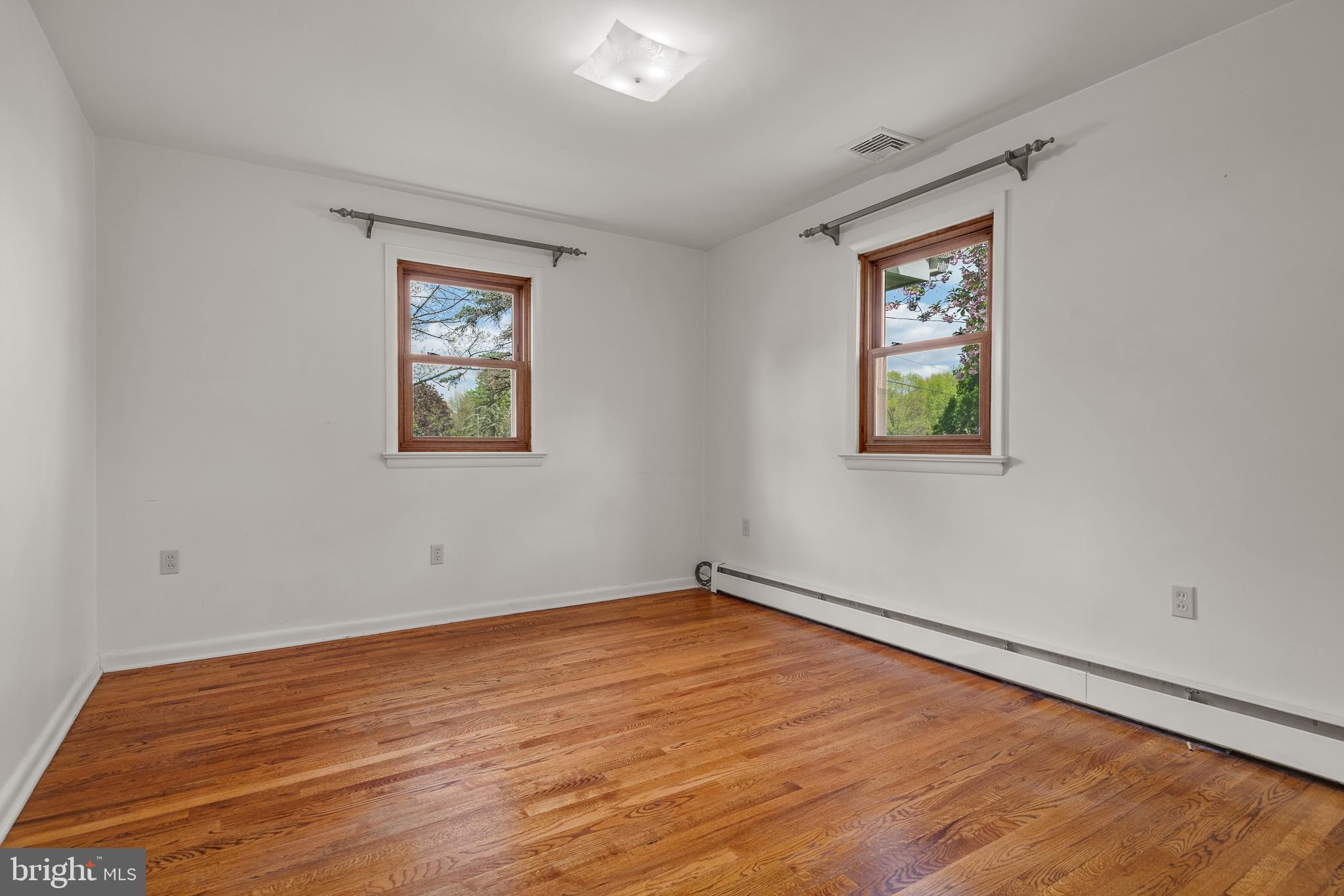 27 Pfautz Avenue Lititz, PA 17543 - Photo 15 of 25 wooden floor in an empty room with a window
