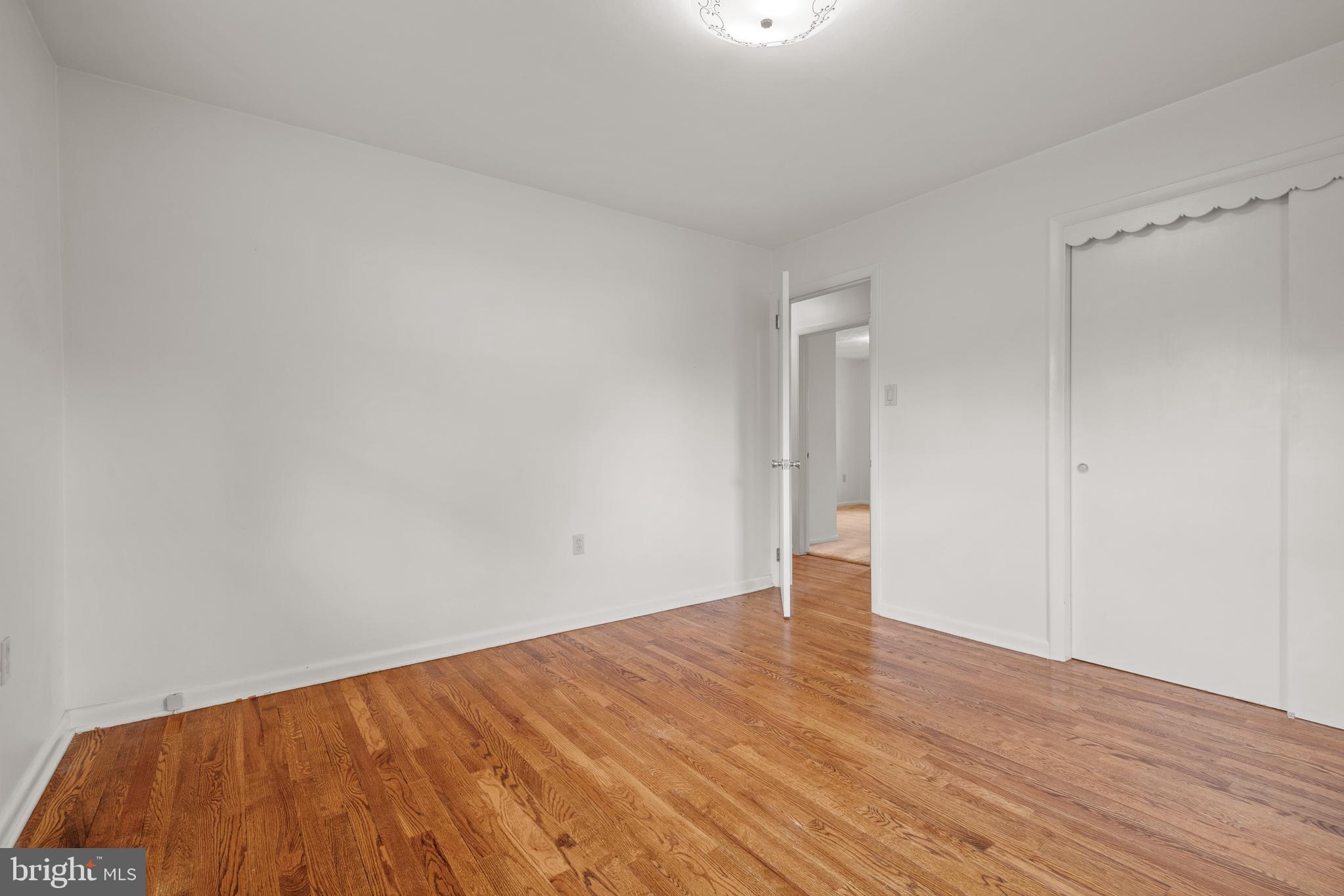 27 Pfautz Avenue Lititz, PA 17543 - Photo 18 of 25 a view of an empty room with wooden floor