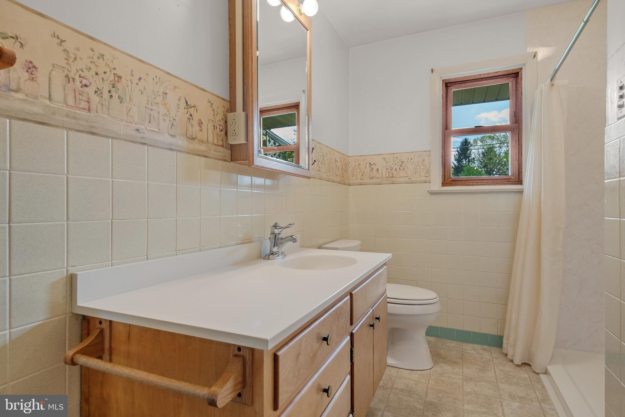 27 Pfautz Avenue Lititz, PA 17543 - Photo 21 of 25 a bathroom with a sink and a toilet