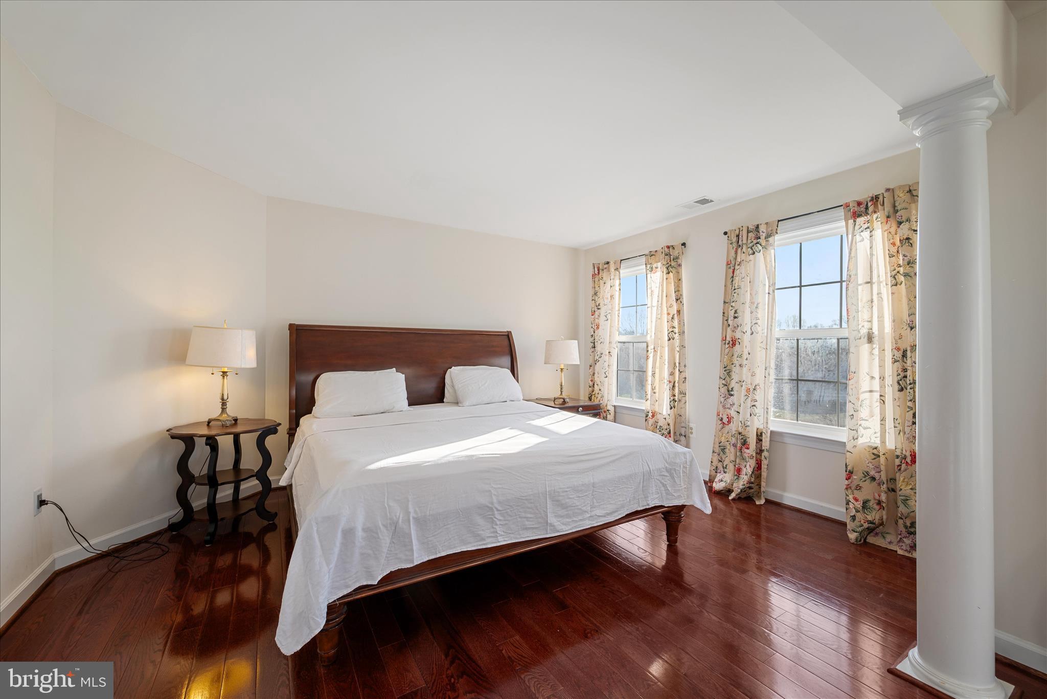 5051 Ridgeview Court Jeffersonton, VA 22724 - Photo 11 of 29 a bedroom with a bed and a large window