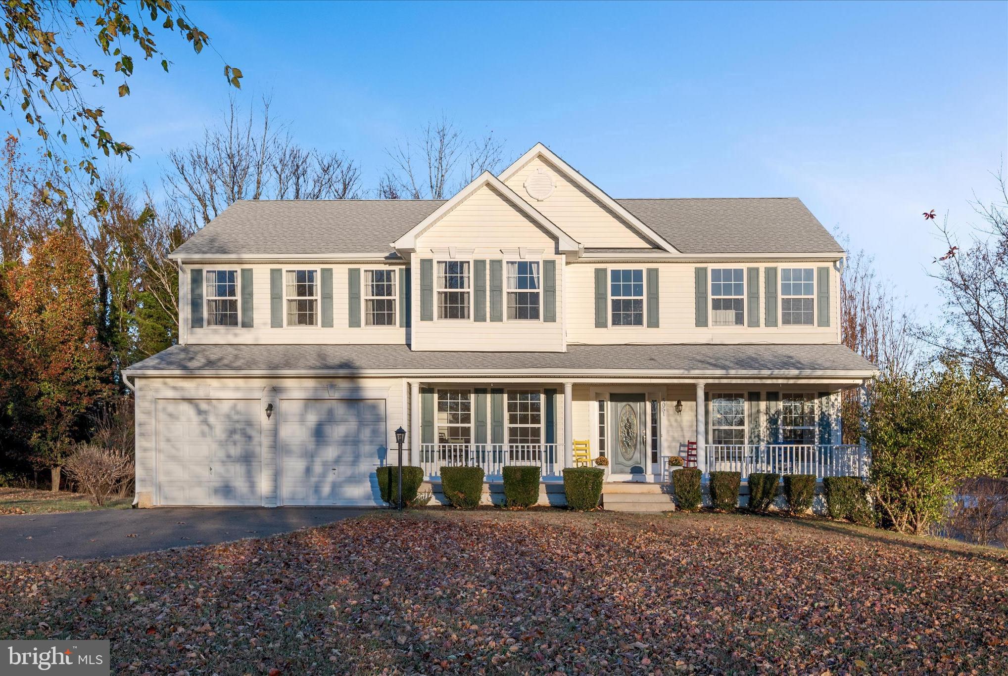 5051 Ridgeview Court Jeffersonton, VA 22724 - Photo 24 of 28 a front view of a house with a yard