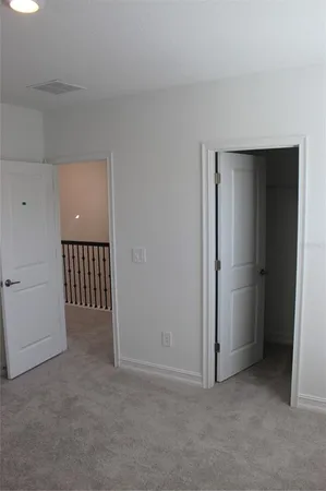 a view of a room with racks on the wall